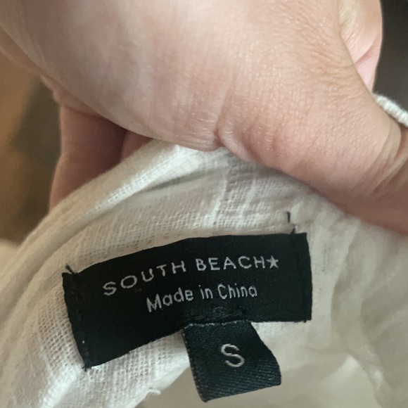 White flow-y shorts from ASOS. Size small. - Picture 3 of 4